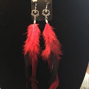 Red feather earrings 6-8”long with a heart charm.